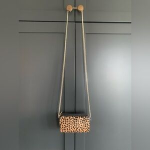 Loeffler Randall mini calf hair crossbody bag.